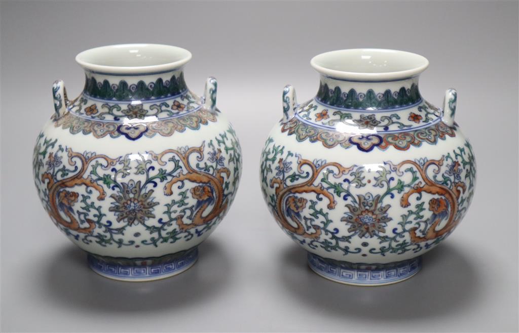 A pair of Chinese two-handled vases, height 15cm